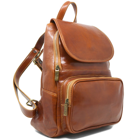 The Floto Livorno leather backpack is a wommen's fashion pack that is handcrafted in Italy. This is the Livorno Backpack in Olive Honey Brown. Side view.
